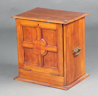 An Edwardian Art Nouveau mahogany stationery box with fall front revealing a fitted interior with pigeon holes and drawer, associated inkwell and pen tray 33cm h x 31cm w x 23cm d 