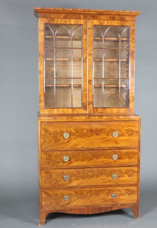 A Georgian mahogany secretaire bookcase with moulded cornice, fitted adjustable shelves enclosed by astragal glazed panelled door, the base with well fitted secretaire drawer above 3 drawers, raised on bracket feet 208cm h x 99cm w x 48cm d 
