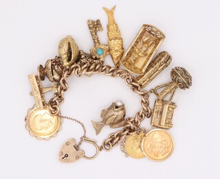 A 9ct yellow gold charm bracelet comprising 11 9ct charms, 2 sovereigns 1927 and 1958 and a half sovereign 1913, gross weight 140.3 grams, (9ct gold weight 120.3 grams excluding sovereigns and half sovereign)