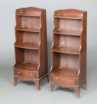 A pair of Georgian style waterfall bookcases fitted 3 shelves, the bases fitted a drawer, raised on splayed bracket feet 98cm h x 38cm w x 25cm d 