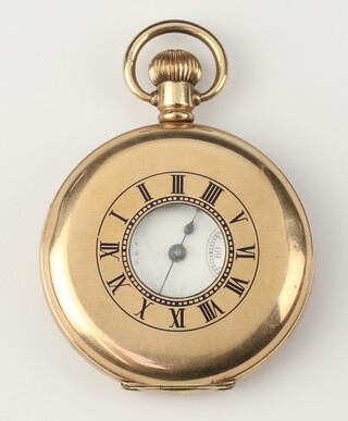 A gold plated half hunter mechanical wristwatch, the dial inscribed Waltham USA with seconds at 6 o'clock , contained in a 50mm case 