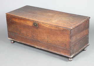 An 18th/19th Century elm coffer with hinged lid, the interior fitted 2 candle boxes, raised on bun feet 50cm h x 119cm w x 51cm d THIS LOT IS WITHDRAWN FROM THE AUCTION 