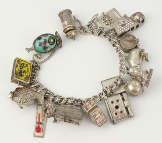 A silver charm bracelet 100 grams 