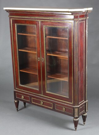 A 19th Century  French mahogany display cabinet with white veined marble top and gilt metal mounts throughout, fitted shelves enclosed by glazed panelled doors, the base fitted 3 long drawers, raised on turned and fluted supports 147cm h x 123cm w x 33cm d 