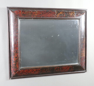 An 18th Century tortoiseshell effect cushion frame containing a later bevelled plate mirror 88cm h x 72cm w  