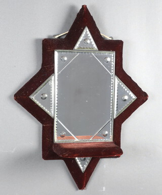 A Victorian cut glass plate wall mirror in the form of elongated 4 pointed star with plus frame and bracket 62cm x 47cm 