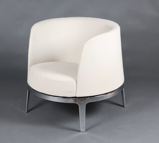 Materia, an Omni design chrome framed revolving armchair 72cm h x 70cm w x 69cm d (seat 40cm x 36cm)