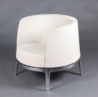 Materia, an Omni design chrome framed revolving armchair 72cm h x 70cm w x 69cm d (seat 40cm x 36cm)