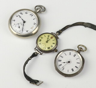 A lady's silver fob watch with engraved case, a ditto wristwatch and a metal pocket watch  