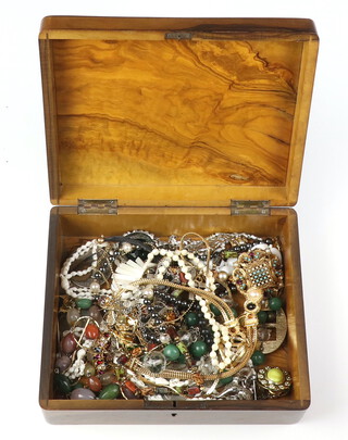 A Jerusalem olive wood box containing a quantity of costume jewellery 