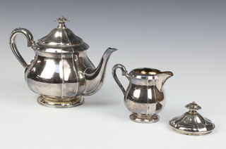 A German white metal 830 teapot and cream jug together with a lid, 729 grams 
