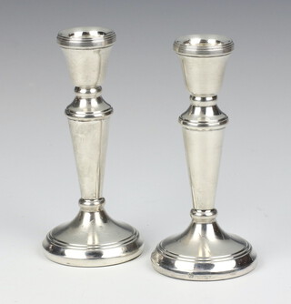 A pair of silver dwarf candlesticks of tapered form Birmingham 1994 12cm 