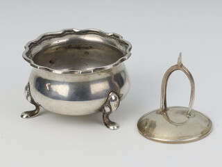 A silver table salt Birmingham 1932 together with a silver menu holder with wishbone clip 59 grams 