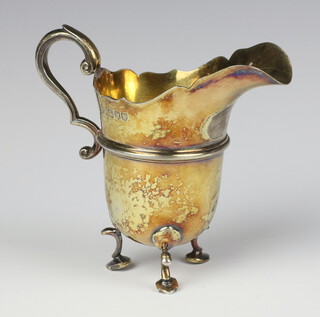 A Victorian silver cream jug with S scroll handle on pad feet London 1895, 154 grams 