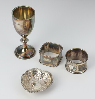 A silver cup Birmingham 1930, 2 napkin rings and a dish, 103 grams