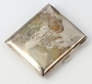 A silver cigarette case with engraved monogram Birmingham 1947 82.6 grams