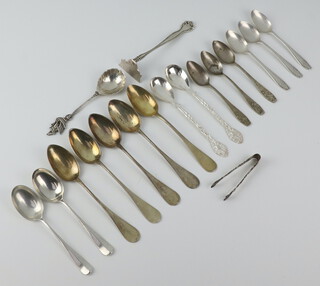 A silver teaspoon Birmingham 1910, a quantity of spoons and mixed cutlery 293 grams 