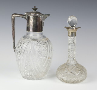 A silver mounted cut glass bottle, rubbed marks, together with a silver plated claret jug 