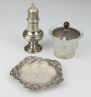 An Edwardian silver butter dish with glass liner Birmingham 1905, silver lidded vase and a sugar shaker (rubbed marks), 172 grams