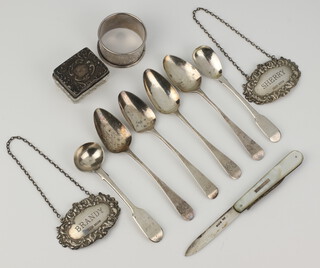 A George IV silver mustard spoon, 5 other spoons, 2 spirit labels, a napkin ring, silver mounted box and fruit knife, weighable silver 128 grams 