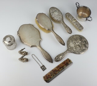 A sterling silver repousse Reynolds Angels hand mirror, 2 hair brushes, clothes brush, hand mirror, hair tidy and minor items 