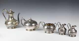 A Victorian 5 piece silver plated tea and coffee set comprising teapot, coffee pot, sugar bowl, 2 milk jugs