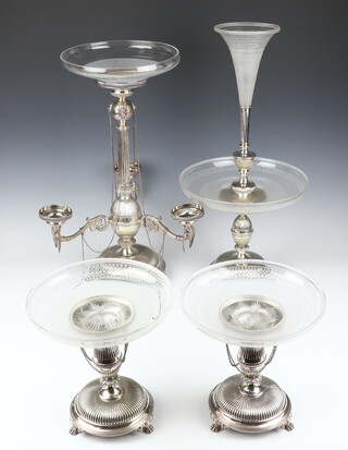 An impressive Victorian silver plated centre piece with replacement glass bowl and 3 receptacles 50cm, a pair of ditto side tazzas with glass bowl (1 bowl a/f) and 1 other with cut glass flute and glass dish 52cm  