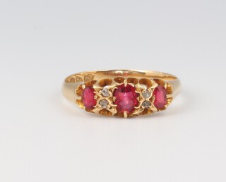 An 18ct yellow gold ruby and diamond ring size P 2.4 grams 