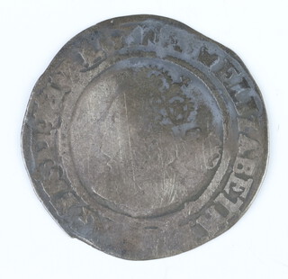 A silver sixpence of Queen Elizabeth I, third/fourth issue, dated 1566, two Scottish hammered silver coins of the 17th Century and 3 silver pennies from the reigns of Edward I 1272 to 1307 and Edward II 1307 to 1327 