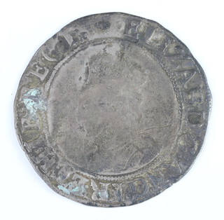 A silver shilling of Elizabeth I, 1560-1, second coinage, 0.925 fineness and a Sterling silver crown of William III 1695 to 1696 