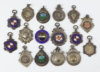 Sixteen silver sports fobs, 112 grams 