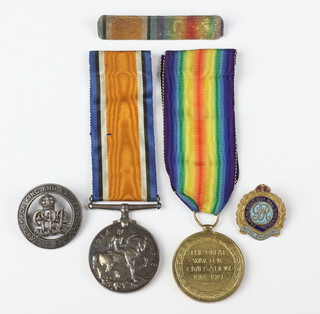 A World War One pair of medals comprising War medal and Victory medal to 2467 Spr.W.Tugwell.R.E together with 2 badges 
