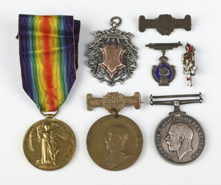 A World War One pair of medals comprising War medal and Victory medal to 7030 Cpl. F.A.Titterell.15/Lond.R. together with a school medal, silver sports fob etc 