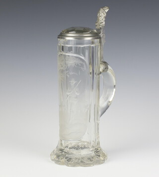 An early 20th Century German cut glass stein with hunting scene and faceted lid with pewter mounts 28cm 