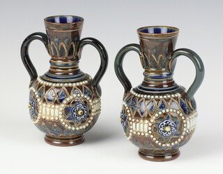 A pair of Doulton Lambeth 2 handled baluster vases with geometric decoration 13cm 