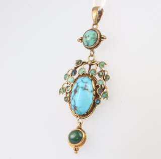 An Edwardian yellow metal turquoise set pendant 50mm, 5.3 grams (1 stone has been replaced)