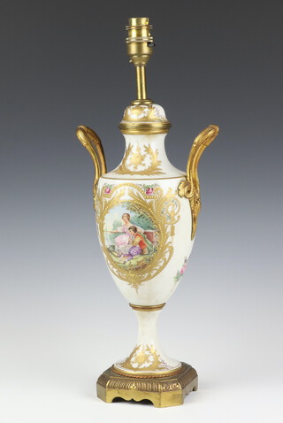A French porcelain gilt metal mounted table lamp with fete gallant views on a raised metal base 35cm h