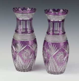 A pair of modern Bohemian glass vases with purple ground 25cm 