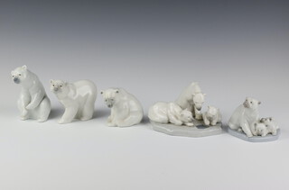 A Lladro group of 3 polar bears 1443 9cm, ditto 8cm, a seated polar bear 9cm, ditto 12cm and a standing polar bear 10cm 