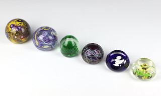 A Selkirk glass paperweight decorated with butterflies 8cm, a Whitefriars ditto 8cm and 4 other paperweights 