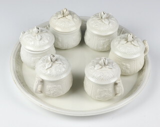 An Italian  white glazed chocolate/coffee set comprising 6 coffee cups and covers together with a circular tray 