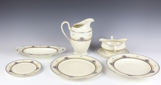 A Rosenthal Ivory pattern part dinner service comprising 12 small plates, 12 side plates, 12 dinner plates, a sauce boat, a tureen and cover, 2 bowls, jug, 4 oval plates, 2 oval dishes and 12 soup bowls