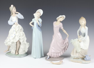 A Nao figure of standing dancer 33cm, a ditto of a lady 26cm, another of a girl with basket 28cm and a lady with bonnet 32cm 
