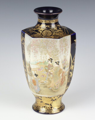 An early 20th Century Japanese Satsuma hexagonal vase decorated with panels of figures in an extensive landscape 25cm 