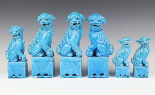 A pair of 20th Century Chinese turquoise glazed figures of Dogs of Fo 25cm, another single 27cm, another 21cm and 2 other 15cm 