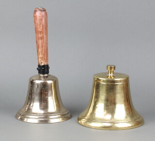 A brass bell (possibly removed from a vehicle) 15cm h x 19cm diam. together with a brass handbell with turned wooden handle