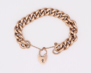 A 9ct yellow gold hollow link bracelet with heart padlock 25.8 grams, 18cm 