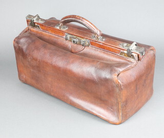 A brown leather Gladstone bag 20cm x 44cm x 23cm d 