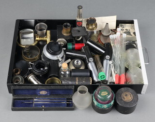 A collection of microscope parts