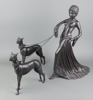 An Art Deco style bronze figure group of a standing lady leading 2 Great Danes  44cm x 31cm x 16cm 